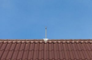 Lightning rod on metal roof
