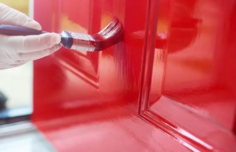 painting door with red gloss paint-min