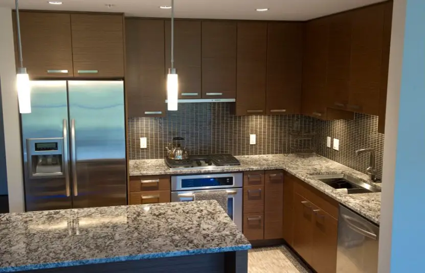 kitchen with Island with granite countertops